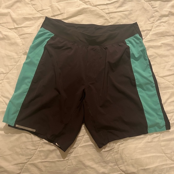 Lululemon athletic shorts. Size Large. No side pockets,  a back zipper pocket. - Picture 1 of 3